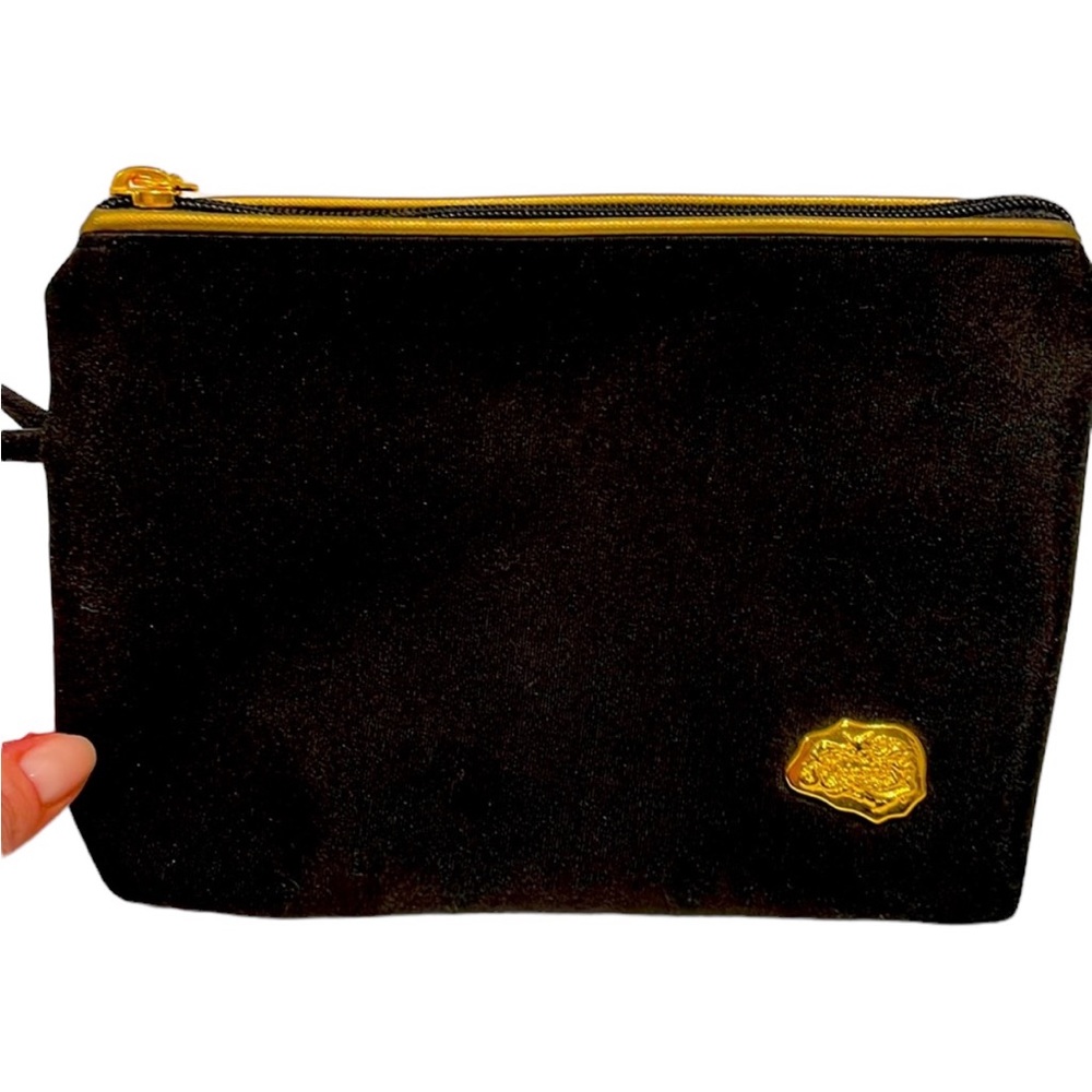 Carlos Falchi Zippered pouch in black with gold detail. New.